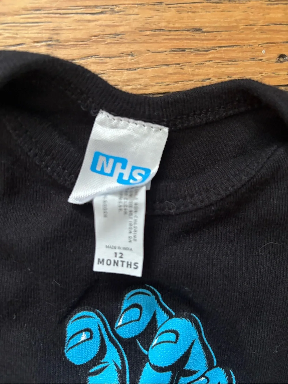 Santa Cruz Black Baby Bodysuit with Blue Screaming Hand Graphic